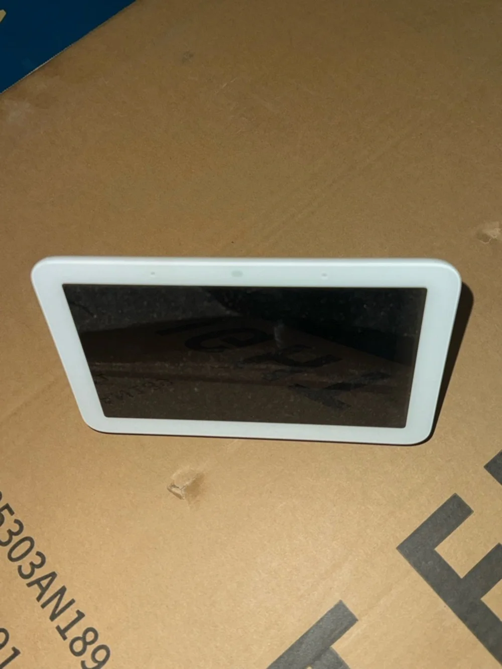 google Nest Hub smart display in white and light gray